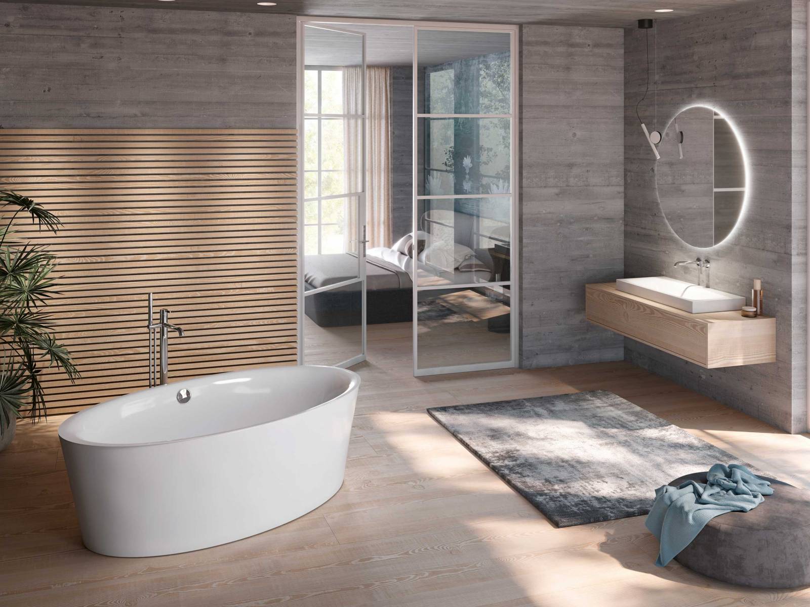 Die weich fliessende Form weisen alle drei Modelle der Badewannen-Kollektion «Ella» auf. Sie schmiegen sich sanft an Rücken, Nacken und Kopf und lassen sich auf Wunsch mit Massagedüsen ausstatten. SCHMIDLIN.